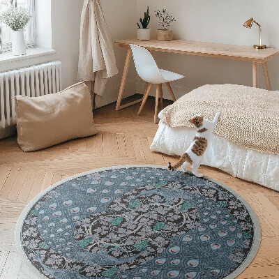 Okrúhly vinylový koberec Modré pávy vo viniciach