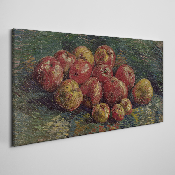Obraz canvas Jablká na zelenom pozadí