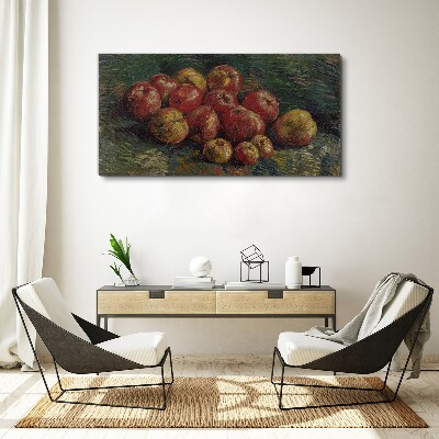Obraz canvas Jablká na zelenom pozadí