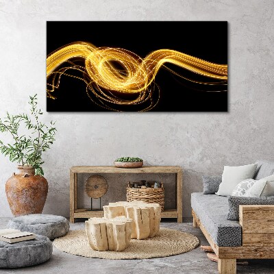 Obraz canvas Zlaté pruhy svetla na čiernej