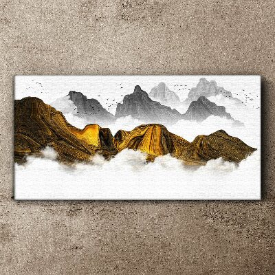 Obraz canvas Zlaté hory v oblakoch