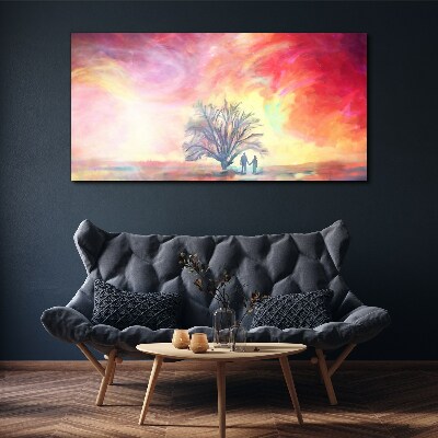 Obraz Canvas Romantický západ slnka pod stromom