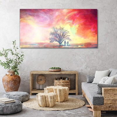Obraz Canvas Romantický západ slnka pod stromom