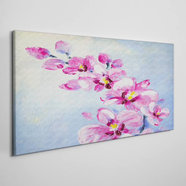 Obraz canvas Ružové orchidey na modrom pozadí