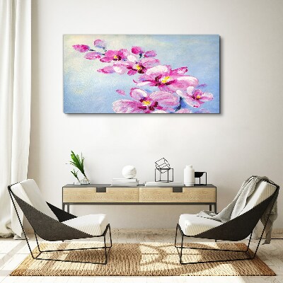 Obraz canvas Ružové orchidey na modrom pozadí