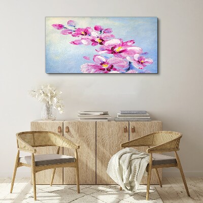 Obraz canvas Ružové orchidey na modrom pozadí