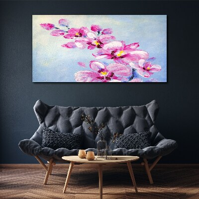 Obraz canvas Ružové orchidey na modrom pozadí