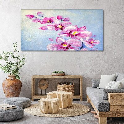 Obraz canvas Ružové orchidey na modrom pozadí