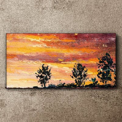 Obraz canvas Západ slnka nad stromami