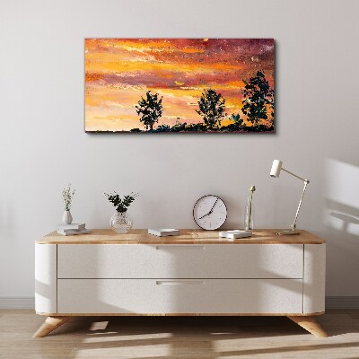 Obraz canvas Západ slnka nad stromami