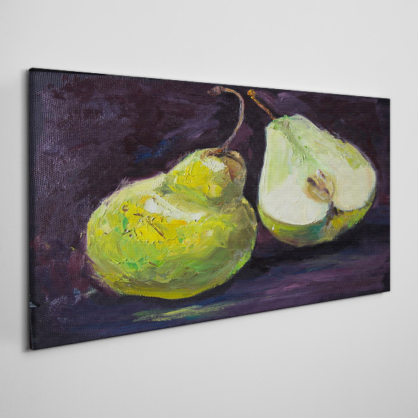 Obraz Canvas Zelené hrušky na tmavom pozadí