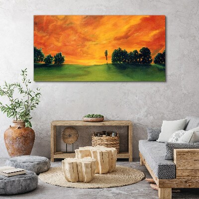 Obraz Canvas Západ slnka nad zeleným kopcom