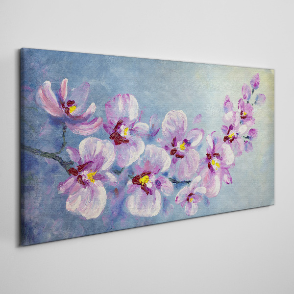 Obraz Canvas Kvetinové orchidey na modrom pozadí