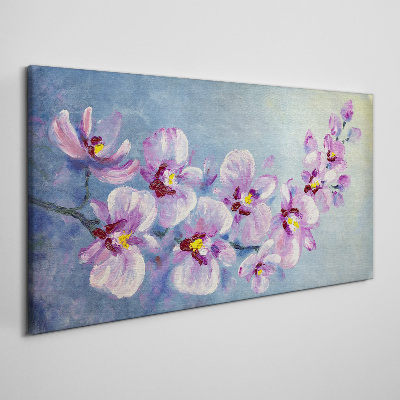 Obraz Canvas Kvetinové orchidey na modrom pozadí
