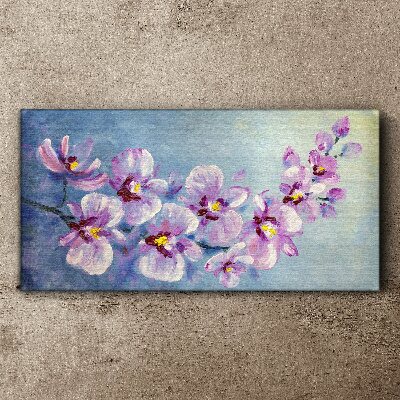 Obraz Canvas Kvetinové orchidey na modrom pozadí