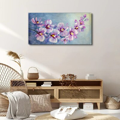 Obraz Canvas Kvetinové orchidey na modrom pozadí