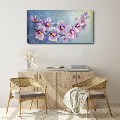Obraz Canvas Kvetinové orchidey na modrom pozadí