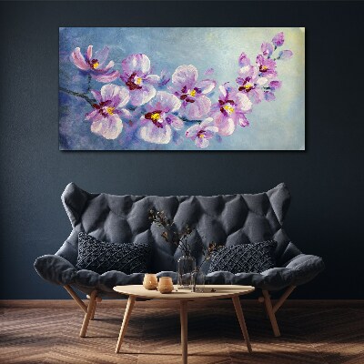Obraz Canvas Kvetinové orchidey na modrom pozadí