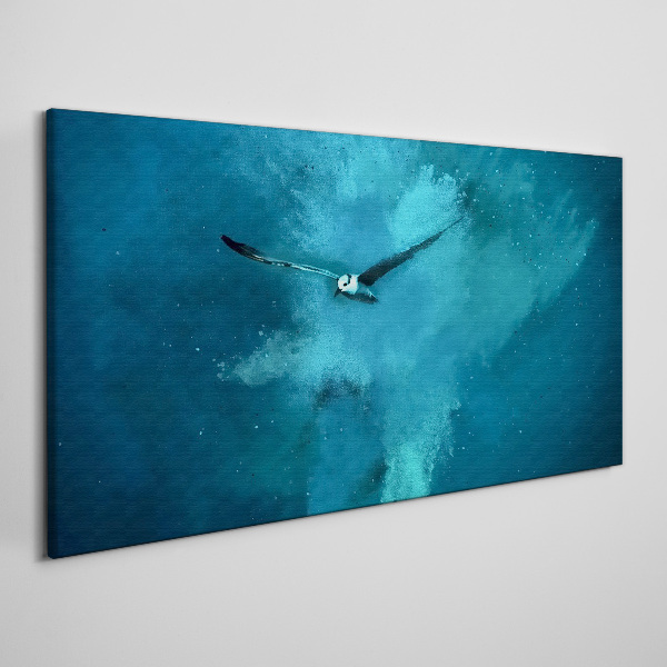 Obraz canvas Vták v modrom priestore