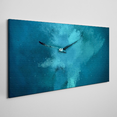 Obraz canvas Vták v modrom priestore