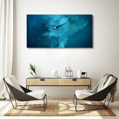 Obraz canvas Vták v modrom priestore