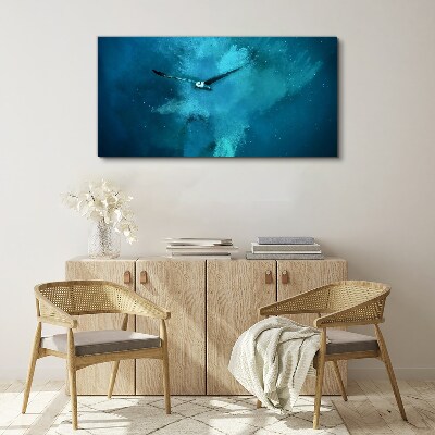 Obraz canvas Vták v modrom priestore