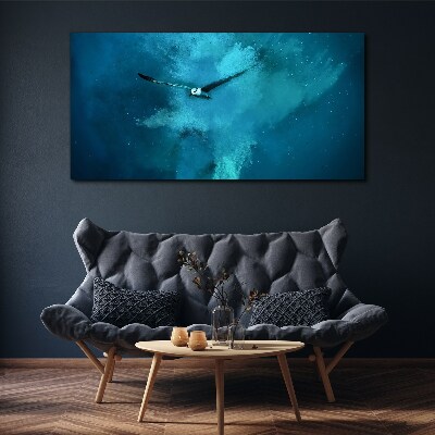 Obraz canvas Vták v modrom priestore