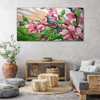 Obraz canvas Vták na pozadí jarných kvetov