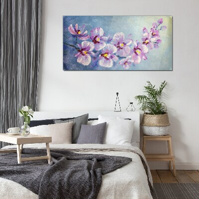 Skleneny obraz Kvetinové orchidey na modrom pozadí
