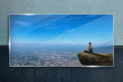 Obraz na skle Meditácia na vrchole hory