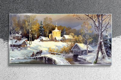 Obraz na skle Zimná krajina s dedinským kostolom