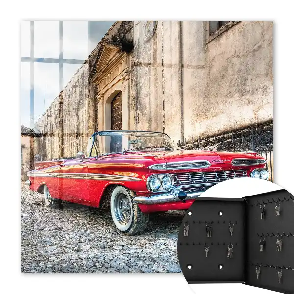 Retro auto na pozadí architektúry