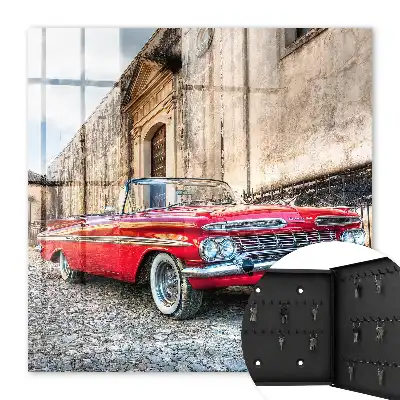 Retro auto na pozadí architektúry