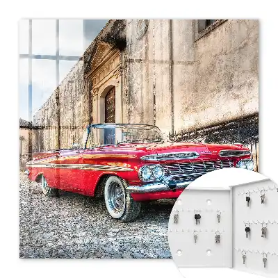 Retro auto na pozadí architektúry